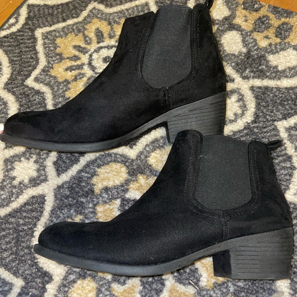 Black suede booties elastic on ankle for stretch purposes. Practically new.